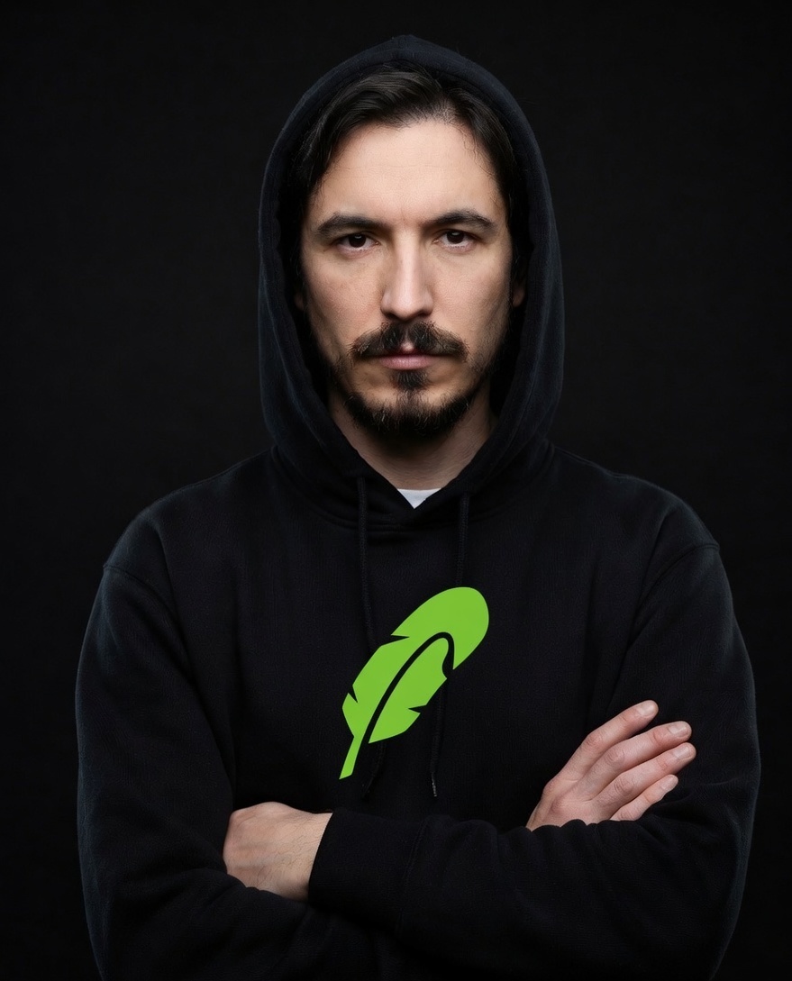 Vlad serious arms crossed in black hood
